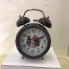 The metal casing of the ringing alarm clock has a novel design details Picture